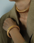 Dikke stretch designarmband en choker