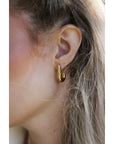 CURVA stud earrings