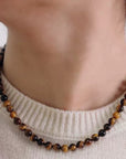 Chique ketting met tijgeroogkralen en zilveren S-haak