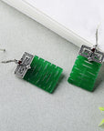 Boucle d'oreille pendante en jade véritable avec le caractère '囍' de style chinois