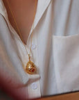 Véritable collier pendentif médaillon oeuf en or royal rubis