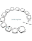 Stevige sterlingzilveren armband met gedurfde look en vierkante frameschakels met OT-gesp