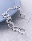Stevige sterlingzilveren armband met gedurfde look en vierkante frameschakels met OT-gesp