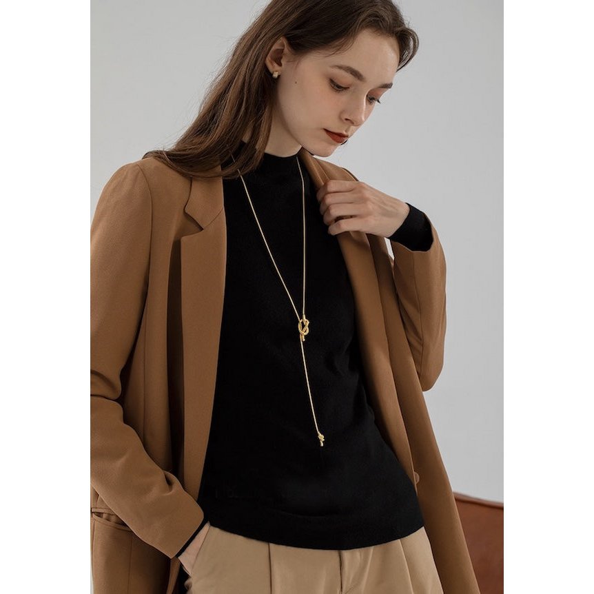 Minimalistische lange trui ketting met knoop