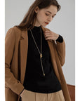 Minimalistische lange trui ketting met knoop