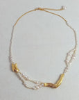 Zoetwaterparels ketting met gouden bedels