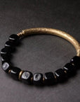 Zwarte obsidiaan blokken armband met bronzen armband