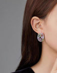 Sparkling gemstone earrings in waterlily design