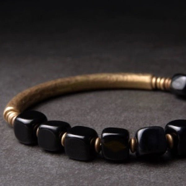 Zwarte obsidiaan blokken armband met bronzen armband